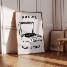 a sign that says if it's nice, play it twice next to a chair