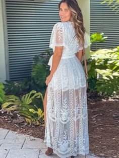 Bohemian V-neck, split embroidered lace dress, resort white maxi dress White Flowy V-neck Maxi Dress, Delicate Lace V-neck Dress For Brunch, Summer V-neck Lace Dress, V-neck Lace Patchwork Dresses For Vacation, V-neck Dress With Lace Trim For Vacation, Floor-length Dress For Brunch During Beach Season, Beach V-neck Lace Dress, Floor-length Maxi Dress For Brunch During Beach Season, White Long Maxi Dress For Party