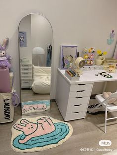 a room with a mirror, dresser and other items on the floor in front of it