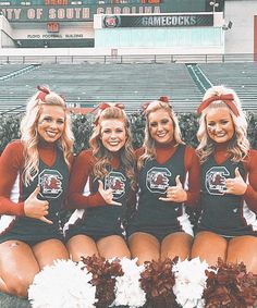 the cheerleaders are posing for a photo together