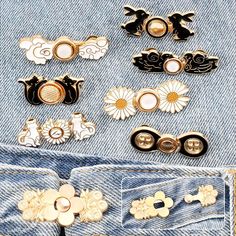 several different types of buttons in the back pocket of someone's jean pants and jeans