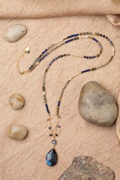 Discover the vibrant and stunning colors of the Blue Moon Collection in this eclectic necklace! Gold Filled (Lead & Nickel Free) Lapis Lazuli, Pyrite, Sodalite, Labradorite, Mother Of Pearl, Abalone 30.5-32.5" adjustable length, with gold filled lobster claw clasp We hand select our natural materials, thus there may be slight variations in color and/or size that will not detract from the overall aesthetic. Our unique handcrafted designer jewelry for women is made in America, each design created Eclectic Necklace, The Blue Moon, Abalone Jewelry, Silver Gold Necklace, Silver Gold Earrings, Pyrite Necklace, Jewelry Diy Ideas, Lapis Jewelry, Mystical Jewelry