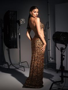 This elegant Peyton Crystal Embellished Leopard Maxi Dress is sure to make a statement. Crafted from a luxe leopard-print fabric, it features crystal embellishments for a glamorous finish. You'll feel confident and beautiful in or out of the occasion. Material: 100% Polyester Invisible zipper opening at the back Stretch Factor: Non Stretch Clean: Hand wash cold Color may vary due to the lighting on images. The product images (without model) are the closest to the true color of the product Model is wearing an S Leopard Maxi Dress, Leopard Print Fabric, Back Stretches, Leopard Dress, Invisible Zipper, Crystal Embellishment, Xl Dress, True Colors, Leopard Print