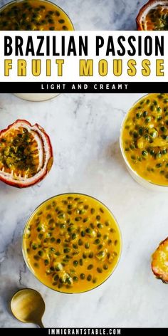 two bowls of brazilian passion fruit mousse on a marble table with spoons