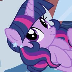 the pinkie is laying down with her eyes wide open and stars on her nose