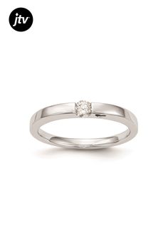 a white gold ring with a single diamond