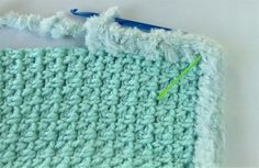 the crochet stitch is being worked on