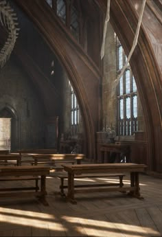 the interior of an old church with wooden benches