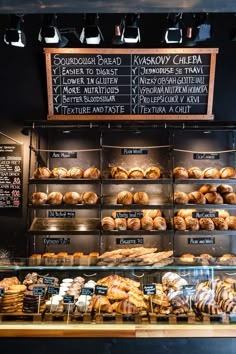 a bakery display filled with lots of pastries