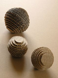 three pieces of wood sitting on top of a table