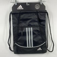 Adidas Alliance Ll Black Sackpack Backpack Nwt About This Item Drop Mesh Water Bottle Pockets. Easy Cinch Opening With Durable Cording Straps. Zippered Exterior Pocket For Your Phone Or Small Stuff. Description As Useful As It Is Classic - This Is The Iconic Sackpack For Athletes. Perfect For When You Need A Bit Of Extra Storage For Shoes Or Clothes Or It Can Be Worn Alone As A Backpack Alternative. With 2 Water Bottle Pockets And A Zippered Outside Drop Pocket - It Has All The Value You Need. Black Nylon Drawstring Bag For Everyday Use, Functional Black Tote Backpack, Black Functional Backpack Tote, Black Large Capacity Drawstring Backpack, Black Gym Shoulder Bag For Outdoor Activities, Black Shoulder Gym Bag For Outdoor Activities, Functional Black Drawstring Bag For Travel, Black Gym Shoulder Bag, Casual Black Nylon Drawstring Bag