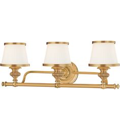 three light brass bathroom fixture with white shades