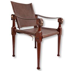 a wooden chair with leather upholstered back and arms