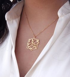 * This calligraphy necklace is inspired by a poem of the Persian well-known poet Khayyam. * The text is "چو هستی خوش باش" which means "Seize the moment". ooo SPECIFICATIONS: * Material: 925 Sterling Silver, 18K Gold Plated * Pendant Dimension: 3.3 cm (1.3 in) X  2.5 cm (1 in) * Chain Length: 45 cm (17.7 in) * Available both in gold and silver color. * High-quality materials and attention to detail * Handmade ooo WHAT YOU WILL GET: * The Necklace (Ring is NOT included, it is available separately Traditional Handmade Jewelry For Personalized Gift, Traditional Personalized Necklace As Gift, Handmade Traditional Jewelry For Personalized Gift, Traditional Personalized Necklaces As Gift, Traditional Personalized Necklace For Gift, Traditional Pendant Necklaces Personalized, Traditional Personalized Pendant Necklaces, Symbolic Name Necklace For Gift, Traditional Engraved Necklace For Personalized Gift