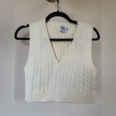 Never Worn Princess Polly Cream Cropped Sweater Vest In Size S/M! Can Be Layered Or Worn By Itself! Medium Weight Cable Knit Slight Crop, Hits Me At About My Waist (Short Torso, 5’4, 35 Inch Bust) White Knit V-neck Crop Top, White Knit Sweater Vest For Spring, Chic White Knit Sweater Vest, Fitted White Cotton Sweater, Trendy White Knit Tops, Chic White Cotton Sweater Vest, White Cotton Crop Top For Fall, White Fitted V-neck Sweater, Fitted White V-neck Sweater