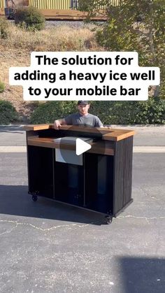 a man standing next to a mobile bar with the caption'the solution for adding a heavy ice well to your mobile bar '