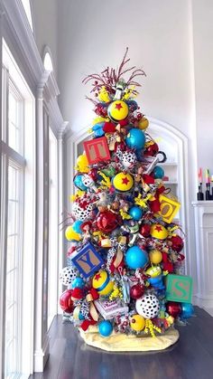 a christmas tree decorated with colorful ornaments