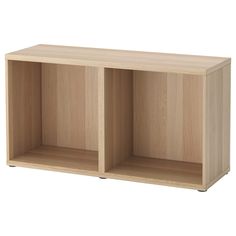 a wooden shelf with two open compartments