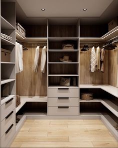 an organized walk in closet with drawers and shelves