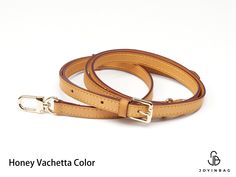 "Looking for a purse strap replacement or want to convert your handbag into a wearable crossbody or shoulder bag? You're in luck! Made out of genuine Vachetta leather in your choice of four colors, our replacement strap is a bestselling accessory among designer bag collectors wanting to expand their options. Thanks to built-in gold metal clips, our shoulder bag strap is replaceable, interchangeable, and adjustable. It's also compatible with the Alma, Ellipse, Neverfull PM, MM or GM, Multi Pochette, Pochette Metis, Odeon, Batignolles, and other designer handbags. You can even use it for 20, 25, 30, and 25 Speedy conversions. Choose a black strap, brown strap, tan strap, or beige strap to match the style of your bag. The quality of our replacement shoulder strap is unmatched. The Vachetta pu Purse Handles, Purse Strap, Felt Bag, Handbag Straps, Vintage Louis Vuitton, Designer Bag, Bag Handle, Bag Straps, Crossbody Strap