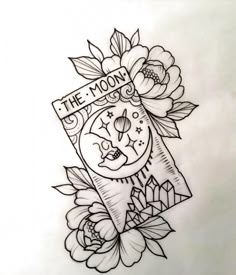 the moon tattoo design on paper with flowers