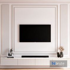 a flat screen tv mounted to the side of a white wall in a living room