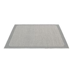 a gray rug on top of a white floor