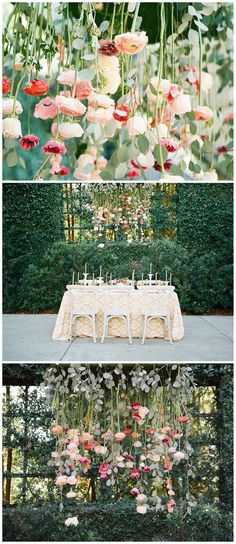 flowers and greenery are hanging from the ceiling in front of a table with white linens