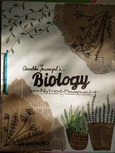 a close up of a book with plants on it and the words biology written in large letters