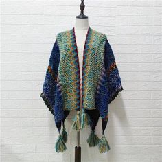 SPECIFICATIONSThickness: STANDARDStyle: CasualSeason: All seasonPattern Type: OtherOrigin: Mainland ChinaMaterial: PolyesterClosure Type: Open StitchCN: Zhejiang Boho Knitted Cardigan, Preppy Aesthetic Outfits, Poncho Women, Colorful Cardigan, Thick Cardigan, Knit Poncho Sweater, Boho Poncho, Knitted Cardigan Sweater, Womens Poncho