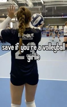 a girl with her back to the camera holding a volleyball ball in front of her