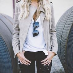 Light grey moto jaceket, white tee, black jeans, and black sunglasses. So stylish!