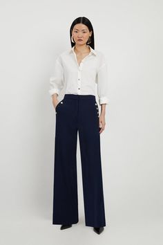 Experience Sleek Tailoring In A Pair Of Wide Leg Trousers, Made Inhigh Quality Fabric With A Four-Way Stretch, With A Dramatic, Wide Fit And A Comfortable High Waistline, And Contrasting, Metallic Buttons On The Pockets. Style It With A Shirt And Heels For A Dressy Look Perfect For Office Days And Formal Events, Or With A T-Shirt And Trainers For A More Laid Back Approach. Compact Stretch Tailored Button Detail Wide Leg Trousers High Quality Stretch Fabric Comfortable High Waistline Flattering W Trouser And Blouse Outfit, Formal Comfortable Outfit, Dress With Trousers, Wide Leg Trouser Outfits Women, Blouse And Dress Pants, Navy Blue Trousers Outfit Women Classy, Alternative Corporate Outfits, Navy Tailored Pants Outfit, Tailored Pants For Petite Women