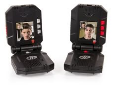 two black video game controllers with pictures on the front and back sides, one showing a man's face