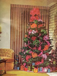 a decorated christmas tree in a living room