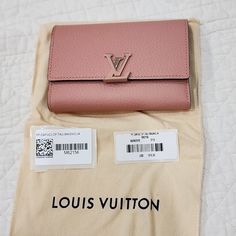 Brand New With Tag. Magnolia Color. Neutrals Taurillon Leather Brass Hardware Leather Lining & Four Interior Pockets With 8 Card Slots Snap Closure Includes Dust Bag Magnolia Colors, Louis Vuitton Capucines, Bags Louis Vuitton, Compact Wallet, Brass Hardware, Snap Closure, Magnolia, Louis Vuitton Bag, Card Slots