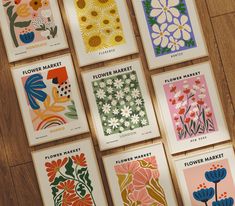 six flower market posters on a wooden floor