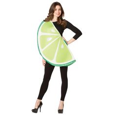 a woman in a neon green dress holding a slice of lemon