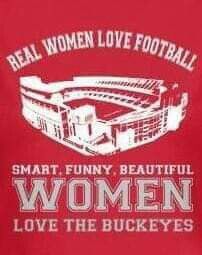 a women's t - shirt with the words real women love football on it