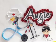 a stethoscope, scissors, and other medical items are arranged in the shape of an angel