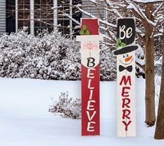 two snowmen are decorated to look like they're in the same direction as each other