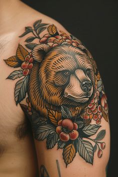 a man with a bear tattoo on his arm