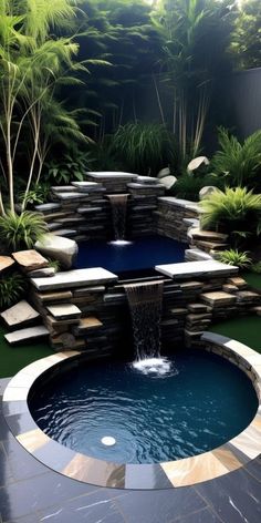 an outdoor pool with waterfall and seating area in the middle, surrounded by greenery