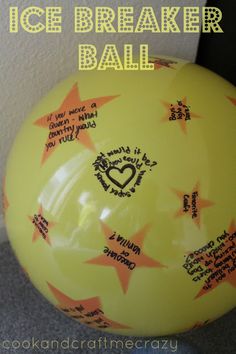 a yellow frisbee with writing on it and the words ice breaker ball written on it