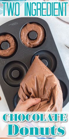 two chocolate donuts in a muffin pan with the words, two ingredient chocolate doughnuts