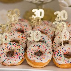 there are many doughnuts with decorations on them