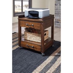 a microwave oven sitting on top of a wooden table