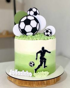 a soccer themed birthday cake with fondant decorations