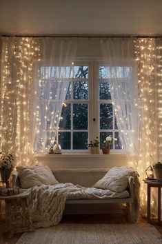 a living room filled with furniture and lots of lights on the window sill,