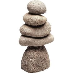 a stack of rocks sitting on top of each other in front of a white background